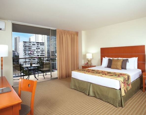 Spacious king room with outdoor terrace at Waikiki Pearl.