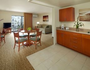 Spacious king suite with kitchen, dining room, and lounge at Waikiki Pearl.