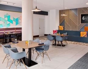 Dining area and work space at Indigo Downtown - University Austin.