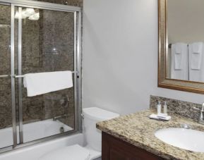 Private guest bathroom with shower at Grande Villas Resort.