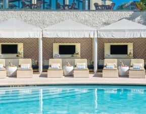 Luxurious cabanas at the poolside available at Naples Grande Beach Resort.