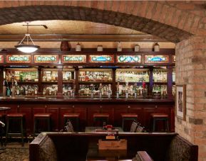 Elephant & Castle, the hotel’s on-site British pub, offers both tables and chairs and bar stool seating.