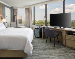 Double bed guest room in the Westin Atlanta Airport Hotel, with large TV and panoramic views.