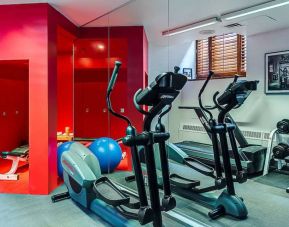 The hotel fitness center has both weights and exercise machines.