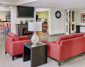 The hotel’s lobby is close to the breakfast area and has comfortable seating for guests.