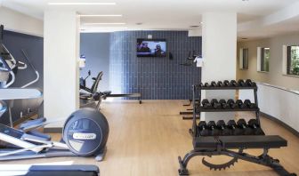 Weights and exercise machines can be used in the hotel’s fitness center.