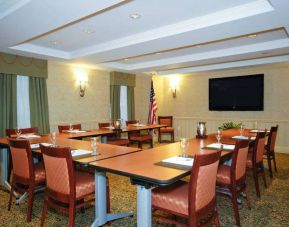 A meeting room in the San Carlos Hotel, with long table and space for a dozen attendees.