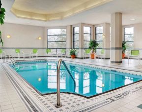 The hotel’s swimming pool is indoors and has plenty of chairs by the side.