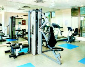 The hotel fitness center has a range of exercise machines for guests.