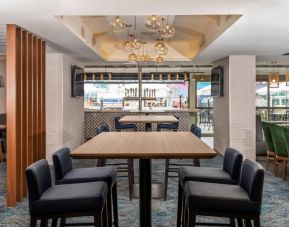 The on-site restaurant has both indoor and outdoor tables, and a bar.