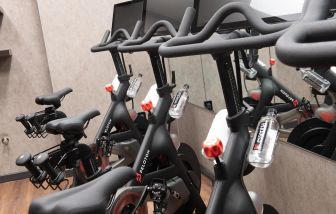 The hotel fitness center, equipped with Peloton exercise bikes.