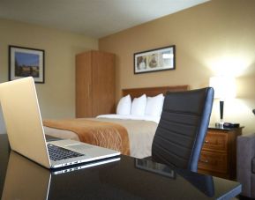 An in-room workspace desk and chair at Comfort Inn Fredericton.