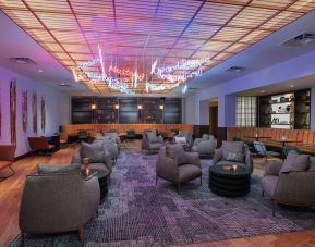 The Rhapsody Room is a lounge for social and corporate events, with comfy seating and coffee tables aplenty.