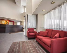 The hotel’s lobby has comfortable seating for guests to socialize and relax.