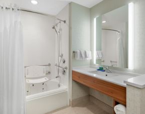 Private guest bathroom with shower at Holiday Inn Express & Suites Ontario.
