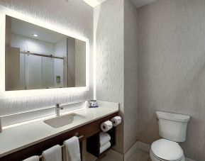 Private guest bathroom with shower at Holiday Inn Express & Suites Airport-Calgary.