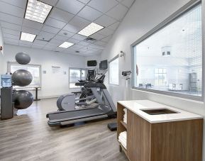 Well equipped fitness center at Holiday Inn Express & Suites Airport-Calgary.
