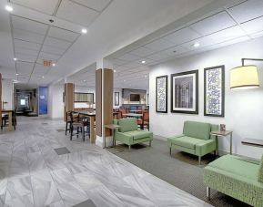 Comfortable lobby and coworking space at Holiday Inn Express & Suites Airport-Calgary.