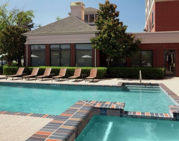 Relaxing outdoor pool at Hilton Garden Inn Dallas/Allen.