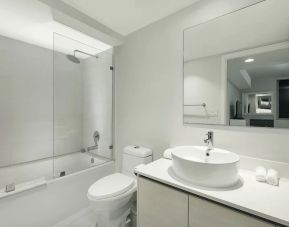 Private guest bathroom with shower at Beachwalk Elite Hotels and Resorts.
