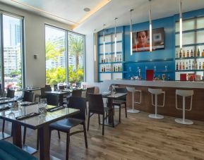 Comfortable dining and coworking space at Beachwalk Elite Hotels and Resorts.
