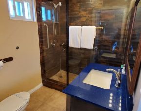 Private guest bathroom with shower at Colony Inn Universal Studios.