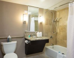 Private guest bathroom with shower at Crowne Plaza Memphis Downtown.