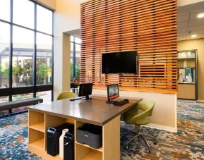 Dedicated business center with PC, internet, and printer at Holiday Inn Miami West-Airport Area.