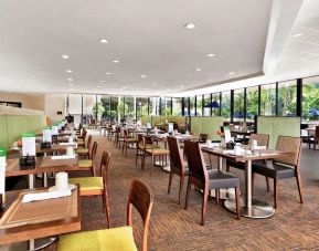 Comfortable dining and coworking space at Holiday Inn Miami West-Airport Area.