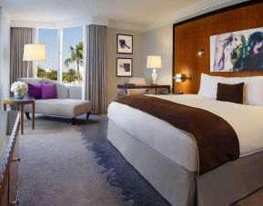 Spacious king bedroom with work station at Pullman Miami Airport.