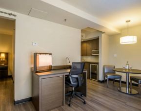 Rodd Miramichi River guest room, featuring in-room workspace with desk and chair.