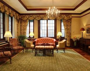 The Wall Street Inn’s lounge lobby, with stylish décor and sofa/armchair seating.