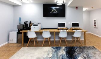 Dedicated business center with PC, internet, and printer at Skylaranna Hotel and Resort.