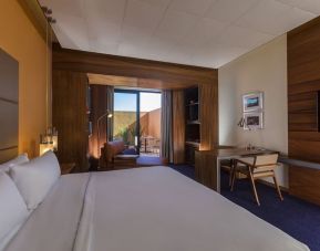 Spacious king bedroom with TV and work station at Hyatt Centric Campestre Leon.