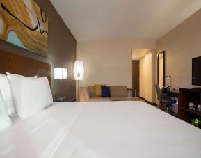 Spacious king bedroom with TV and work station at Hyatt Place Aguascalientes/Bonaterra.