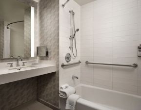 Private guest bathroom with shower at Hyatt Regency at Los Angeles International Airport.