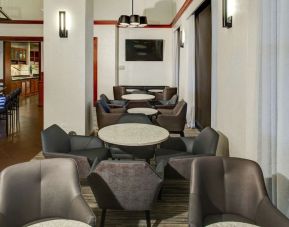 Comfortable dining and coworking space at Hyatt Place Albuquerque Airport.