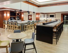 Comfortable dining and coworking space at Hyatt House Boston Burlington.