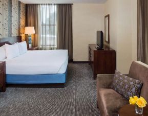 Spacious king bedroom with TV at Hyatt Regency Buffalo Hotel And Conference Center.