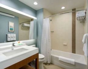 Private guest bathroom with shower at Hyatt Place Chicago Downtown/The Loop.