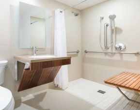 Private guest bathroom with shower at Hyatt Herald Square New York.