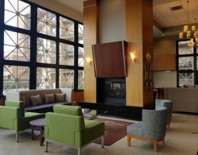 Comfy seats and coffee tables are present in the hotel’s lobby lounge.