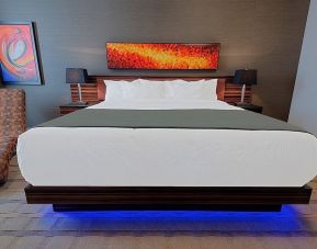 Luxurious and funky style delux king bed at Hotel Clique Calgary Airport.