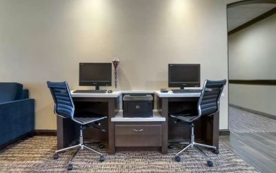 Well-equipped business center with PC, internet, and printer at Comfort Suites Alexandria, LA.