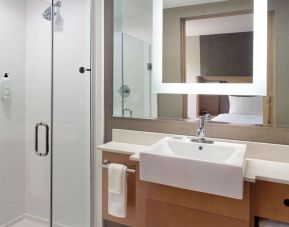 Private guest bathroom with shower at SpringHill Suites Atlanta Northwest.