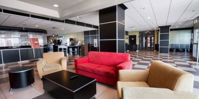 Lobby and coworking lounge at Travelodge Absecon Atlantic City.