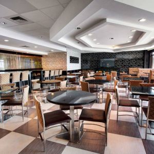 Dining area perfect for coworking at Travelodge Absecon Atlantic City.