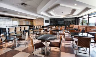 Dining area perfect for coworking at Travelodge Absecon Atlantic City.