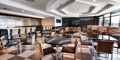 Dining area perfect for coworking at Travelodge Absecon Atlantic City.