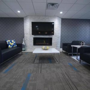 Lobby and coworking lounge at Home Inn & Suites.